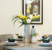 Table with vase and three place settings