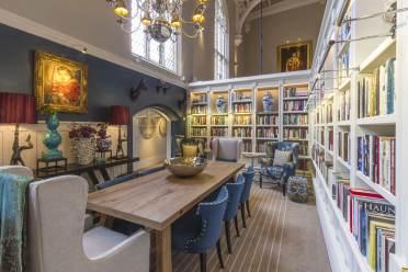Bookshelves and grand Victorian furnishings