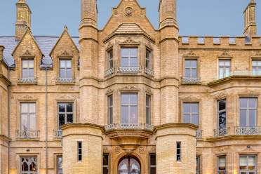 Victorian gothic entrance with towers and turrets