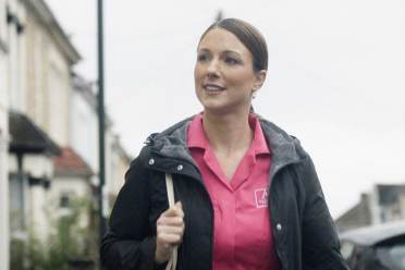 Audley carer walking towards work