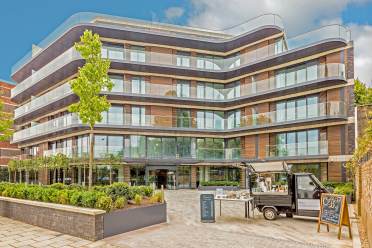 Exterior of a glass building with apartments