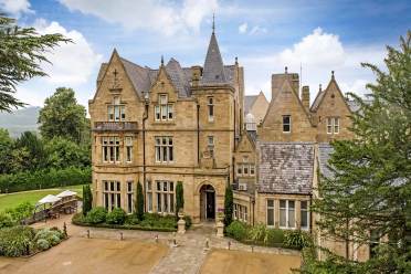 Aerial front view of a Victorian Gothic building