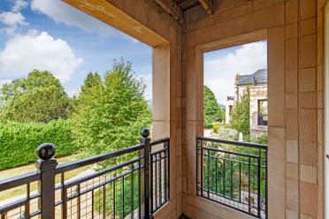 Stone balcony with view of trees