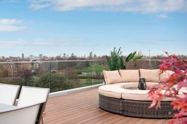 Open roof terrace with view over park
