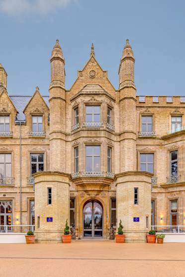 Victorian gothic entrance with towers and turrets