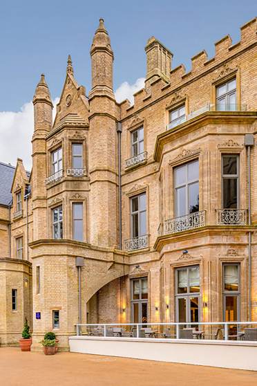 Pale stone building in Victorian-Gothic style