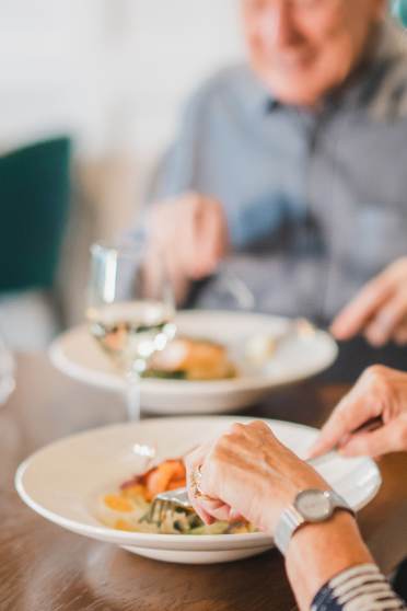 Man and woman dining in restaurant