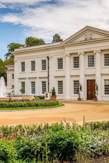Country mansion house with fountain