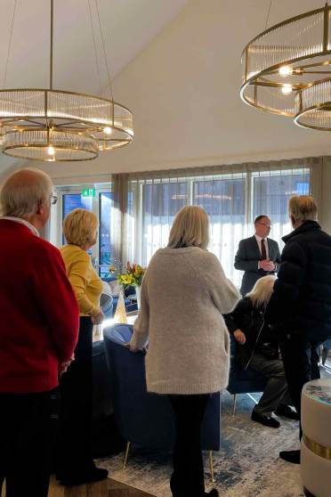 A group of people in a room.