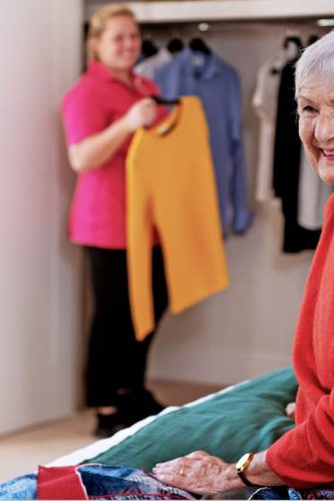 audley homeowner with care assistant in bedroom