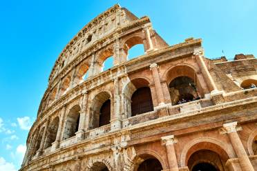 Colosseum on the background of a blue sky