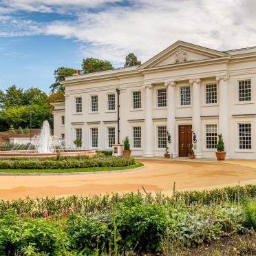 Country mansion house with fountain