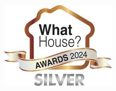 The What House? Awards 2024 logo in gold and silver tones, featuring a ribbon labeled "AWARDS 2024" and the word "SILVER" at the bottom.