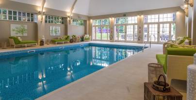 Indoor swimming pool with an arched ceiling