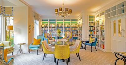 Luxury library in teal and mustard colours