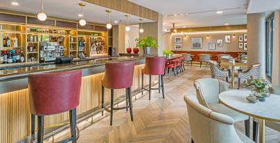 Bar and bistro with maroon bar stools
