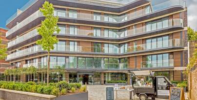 Exterior of a glass building with apartments