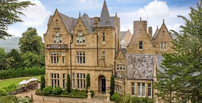Aerial front view of a Victorian Gothic building