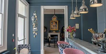 Bistro and bar with stone blue and blush pink interior