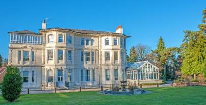 Mansion house and grounds with fountain