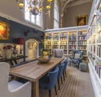 Bookshelves and grand Victorian furnishings