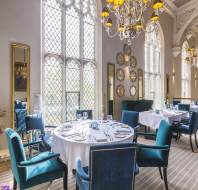 Restaurant tables in grand Victorian dining room