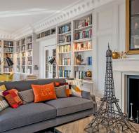 Large fireside sofa with Eiffel Tower decoration