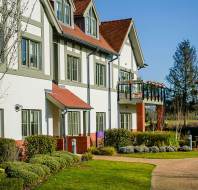 Buildings with red tile roofs and timber beams