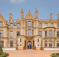 Victorian gothic entrance with towers and turrets