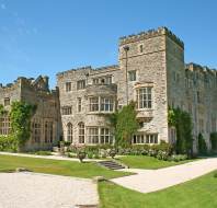 Stone manor house under a blue sky
