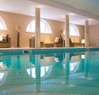 Indoor pool with soft lighting