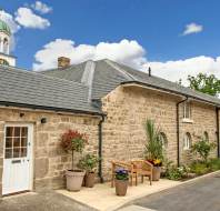 Converted stables in pale stone