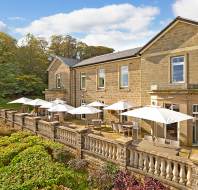 Outdoor terrace with tables and sun umbrellas