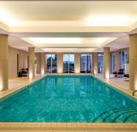 Indoor swimming pool with soft lighting