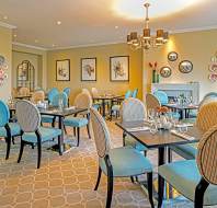 Restaurant tables with wall art