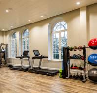 Gym equipment and arched windows