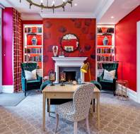 Victorian-style library with red walls