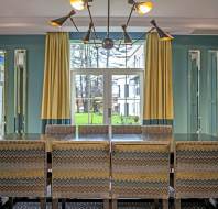 Georgian-style dining room with green walls