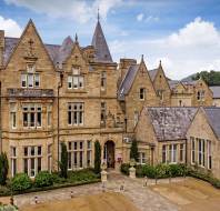 Aerial front view of a Victorian Gothic building