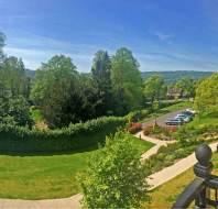 View over garden from an apartment balcony