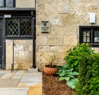 Close up of the side entrance into a stone building