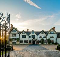 Front view on a Tudor style manor house