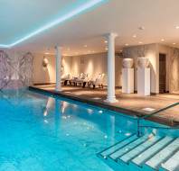 Swimming pool and soft lights on the relaxation area