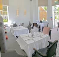Restaurant tables set for lunch