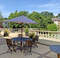 Balcony tables with parasols