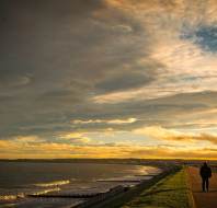 Seafront walk at sunset
