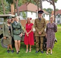 People dressed in 1940s uniforms