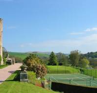 Stone walls and tennis court