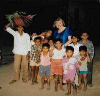 Posing for group photo with children, Bharatpur