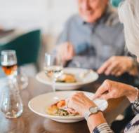 Man and woman dining in restaurant